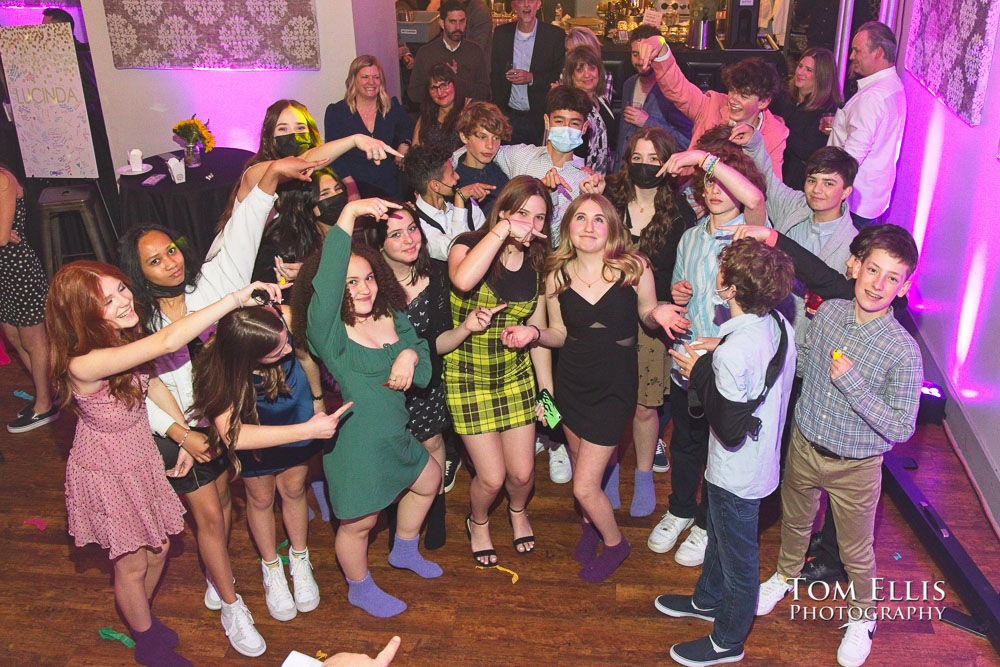 Lucinda is surrounded by her friends during the party following her Bat Mitzvah. Tom Ellis Photography, Seattle mitzvah photographer