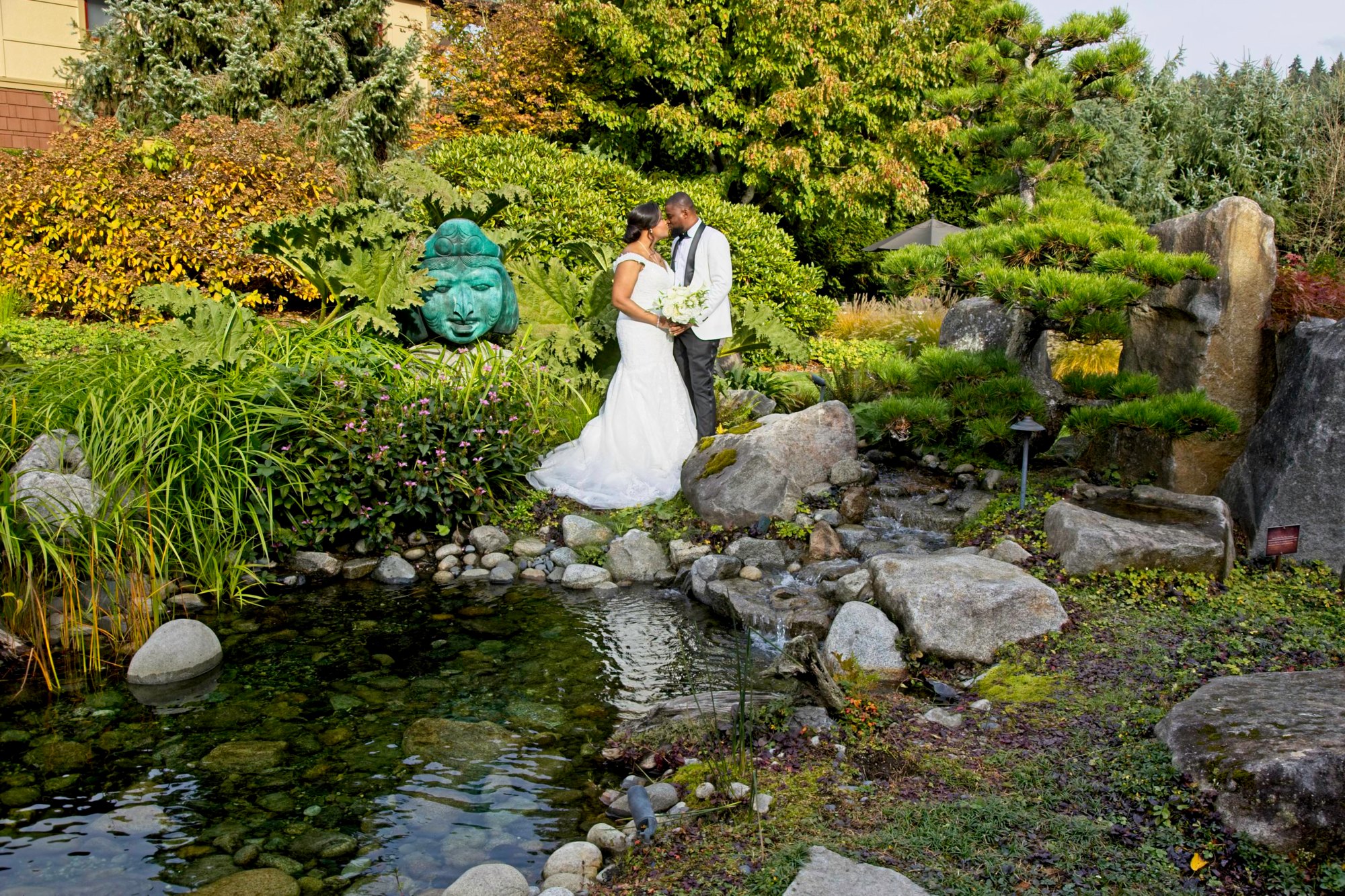 Sue and Shonanun in one of the gardens at Willows Lodge, shortly before their wedding ceremony. Tom Ellis Photography, Seattle wedding photographer
