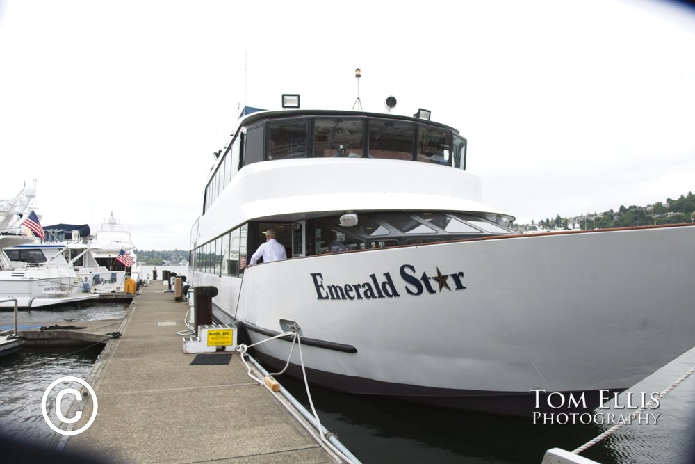 Venita and Mike get married on the stern of the Emerald Star on Lake Union in Seattle. Tom Ellis Photography, Seattle wedding photographer