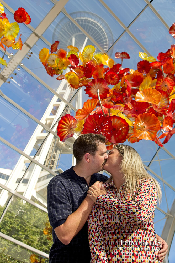 Thomas proposes to Mateja at Chihuly Garden and Glass in Seattle. Tom Ellis Photography, Seattle engagement and proposal photographer