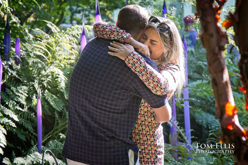 Thomas proposes to Mateja at Chihuly Garden and Glass in Seattle. Tom Ellis Photography, Seattle engagement and proposal photographer