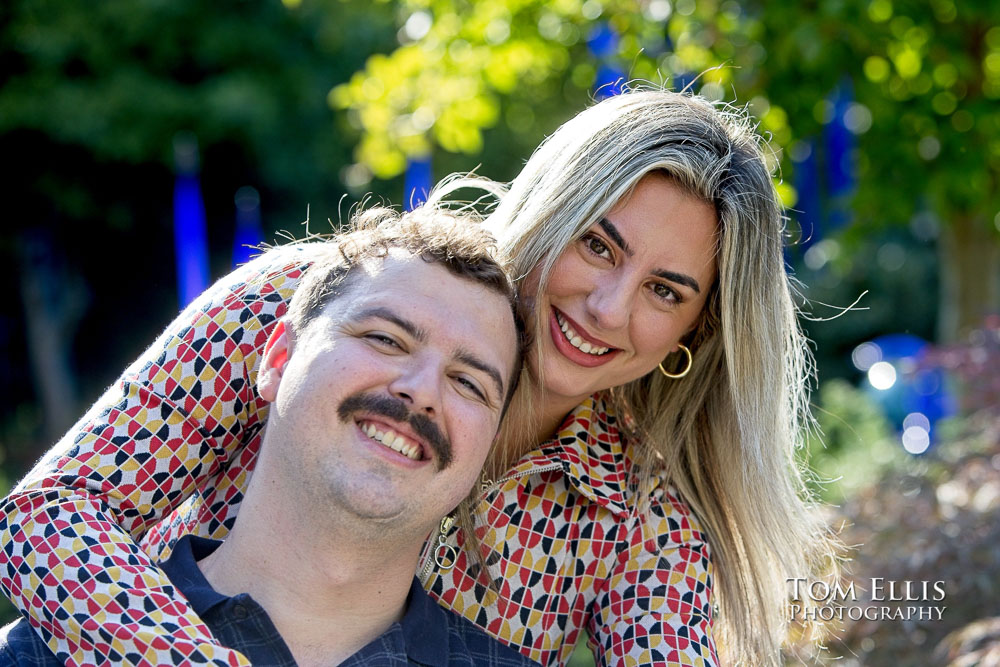 Thomas proposes to Mateja at Chihuly Garden and Glass in Seattle. Tom Ellis Photography, Seattle engagement and proposal photographer