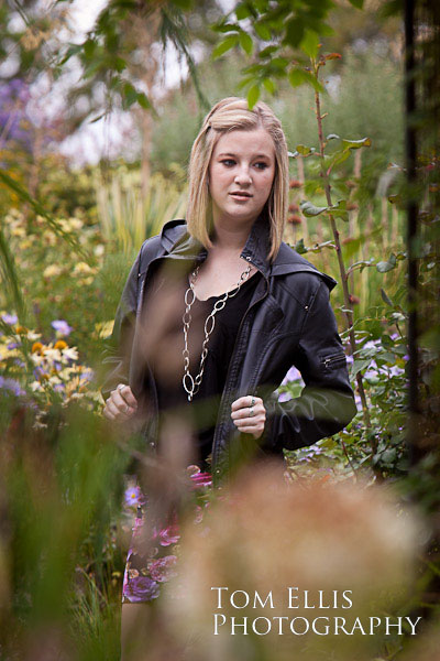 Senior girl in the flowers at Bellevue Botanical Gardens